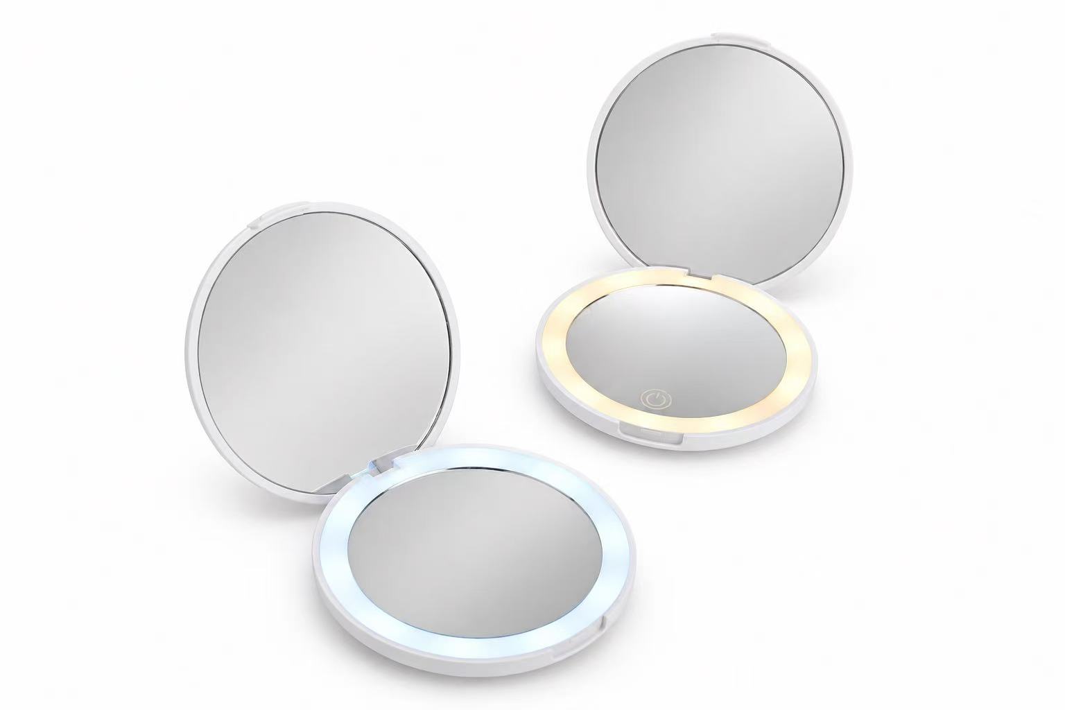 Round compact mirrors with illuminated edges